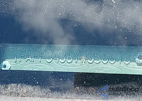 2000 Ford Focus Se z USA, uszkodzony, nr VIN 1FAFP3436YW356673